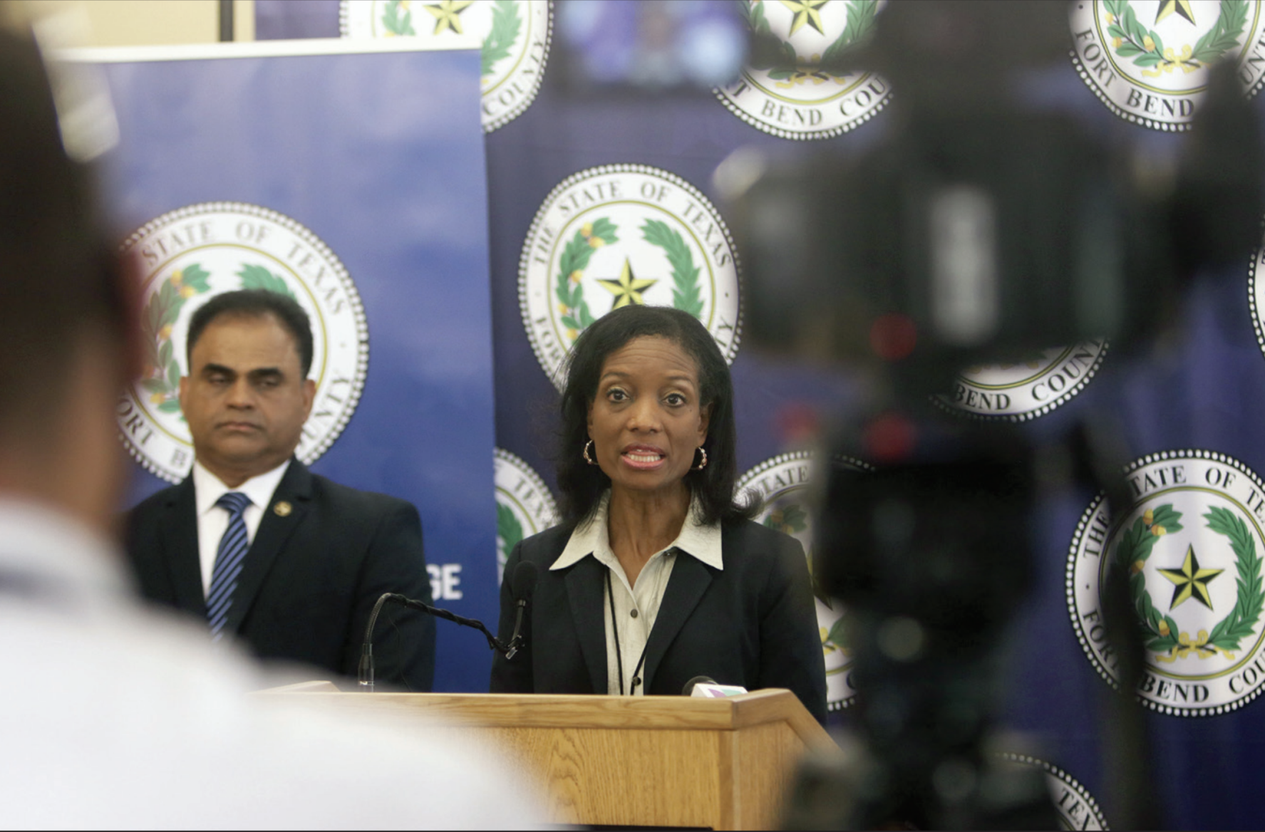 County lowers Covid threat level
